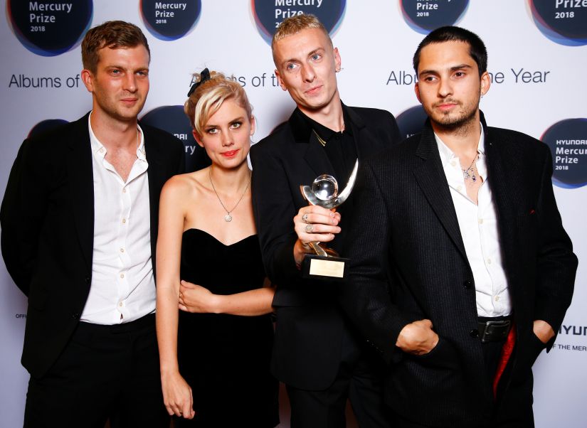 Members of the band Wolf Alice pose with an award after being announced winners of the Mercury Prize 2018 at the Hammersmith Apollo in London, Britain, September 20, 2018. REUTERS/Henry Nicholls - RC1BE19C50F0