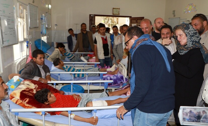 UN's Humanitarian Coordinator in Yemen, Lise Grande, visits children injured in an air strike on 14 August 2018 that killed dozens, mainly children, in Yemen's northern province of Saada. Reuters