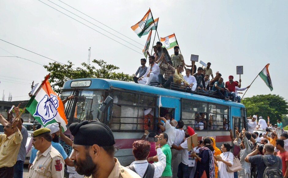 Detained Congress Party workers in Jammu raised slogans after holding Bharat Bandh protests. PTI Detained Congress Party workers in Jammu raised slogans after holding Bharat Bandh protests. PTI