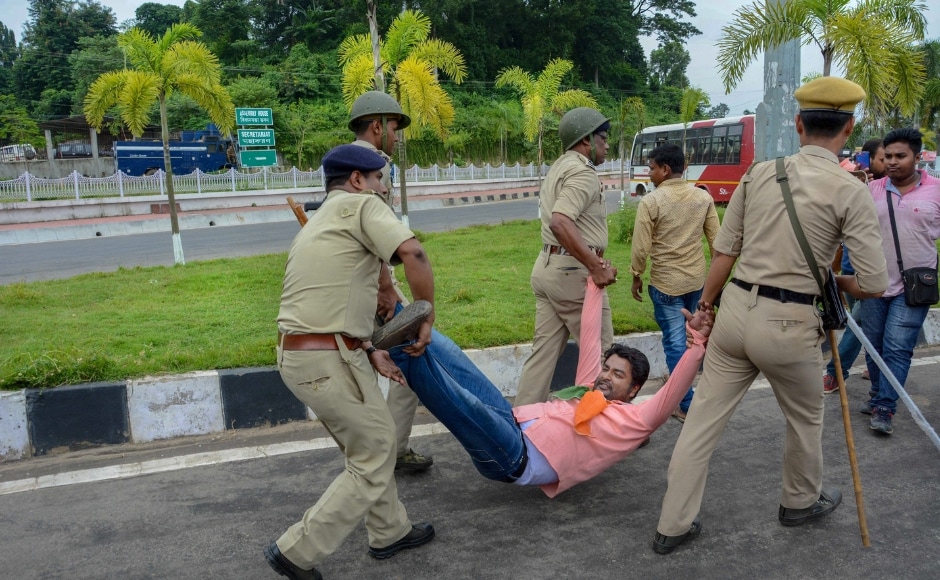 In Tripura capital Agartala, policemen detain a Congress party worker during a 'Bharat Bandh' protest. PTI In Tripura capital Agartala, policemen detain a Congress party worker during a 'Bharat Bandh' protest. PTI