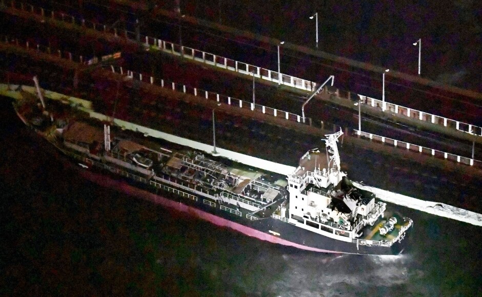 A tanker slammed into the side of a bridge connecting the airport to the mainland, damaging part of the bridge and the vessel in Osaka, western Japan. AP