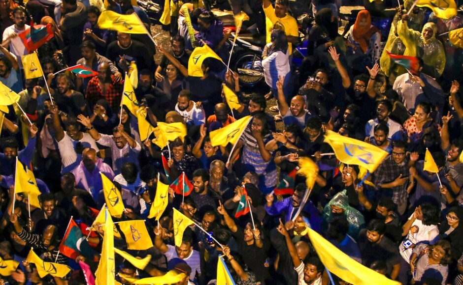 The win was unexpected, and Solih's supporters flooded the streets, hugging one another, waving the Maldivian flag, cheering and honking horns in celebration. AP The win was unexpected, and Solih's supporters flooded the streets, hugging one another, waving the Maldivian flag, cheering and honking horns in celebration. AP