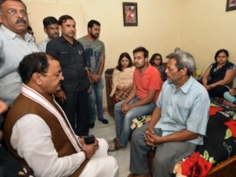 Apple executive Vivek Tiwari killed in Lucknow: Keshav Prasad Maurya visits kin of deceased, assures justice Apple executive Vivek Tiwari killed in Lucknow: Keshav Prasad Maurya visits kin of deceased, assures justice