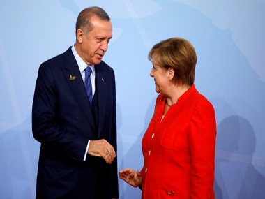 Recep Tayyip Erdogan to hold talks with Angela Merkel amid protests on Turkey president's first State visit to Germany Recep Tayyip Erdogan to hold talks with Angela Merkel amid protests on Turkey president's first State visit to Germany