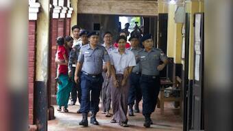 Reuters reporters face verdict in Myanmar 'state secrets' case, could receive jail sentences of 14 years each