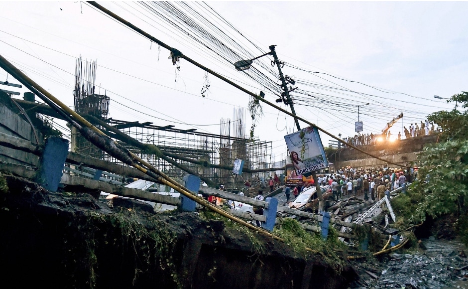 The 40-year-old bridge in the crowded Alipore area caved in around 4.45 pm during rush hour over rail tracks. It runs over the Majerhat Railway Station and connects the city centre to Behala and other southern suburbs. Image courtesy: Sayantanee Choudhary/101Reporters The 40-year-old bridge in the crowded Alipore area caved in around 4.45 pm during rush hour over rail tracks. It runs over the Majerhat Railway Station and connects the city centre to Behala and other southern suburbs. Image courtesy: Sayantanee Choudhary/101Reporters