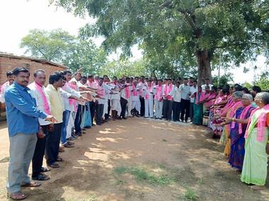 Democracy 'buy' the people in Telangana?: Video of TRS candidate offering money to voters leaves Opposition fuming Democracy 'buy' the people in Telangana?: Video of TRS candidate offering money to voters leaves Opposition fuming