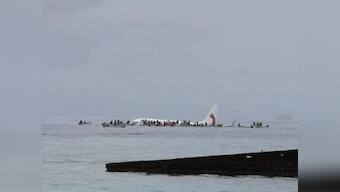 Plane crashes into Micronesia's Pacific lagoon: Passengers, crew forced to swim for lives after craft misses runway