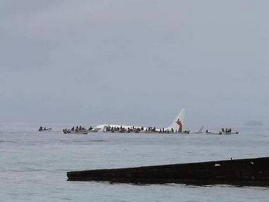 Plane crashes into Micronesia's Pacific lagoon: Passengers, crew forced to swim for lives after craft misses runway