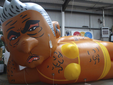 'Make London safe again': Giant balloon depicting Sadiq Khan in yellow bikini flies over London's Parliament Square 'Make London safe again': Giant balloon depicting Sadiq Khan in yellow bikini flies over London's Parliament Square