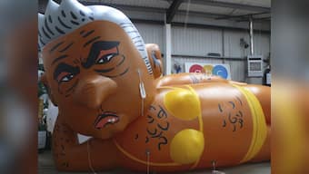 'Make London safe again': Giant balloon depicting Sadiq Khan in yellow bikini flies over London's Parliament Square