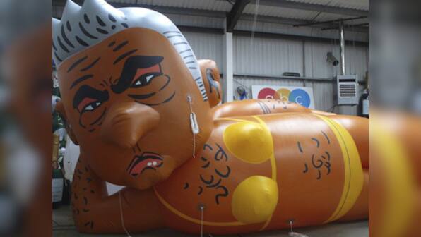 'Make London safe again': Giant balloon depicting Sadiq Khan in yellow bikini flies over London's Parliament Square