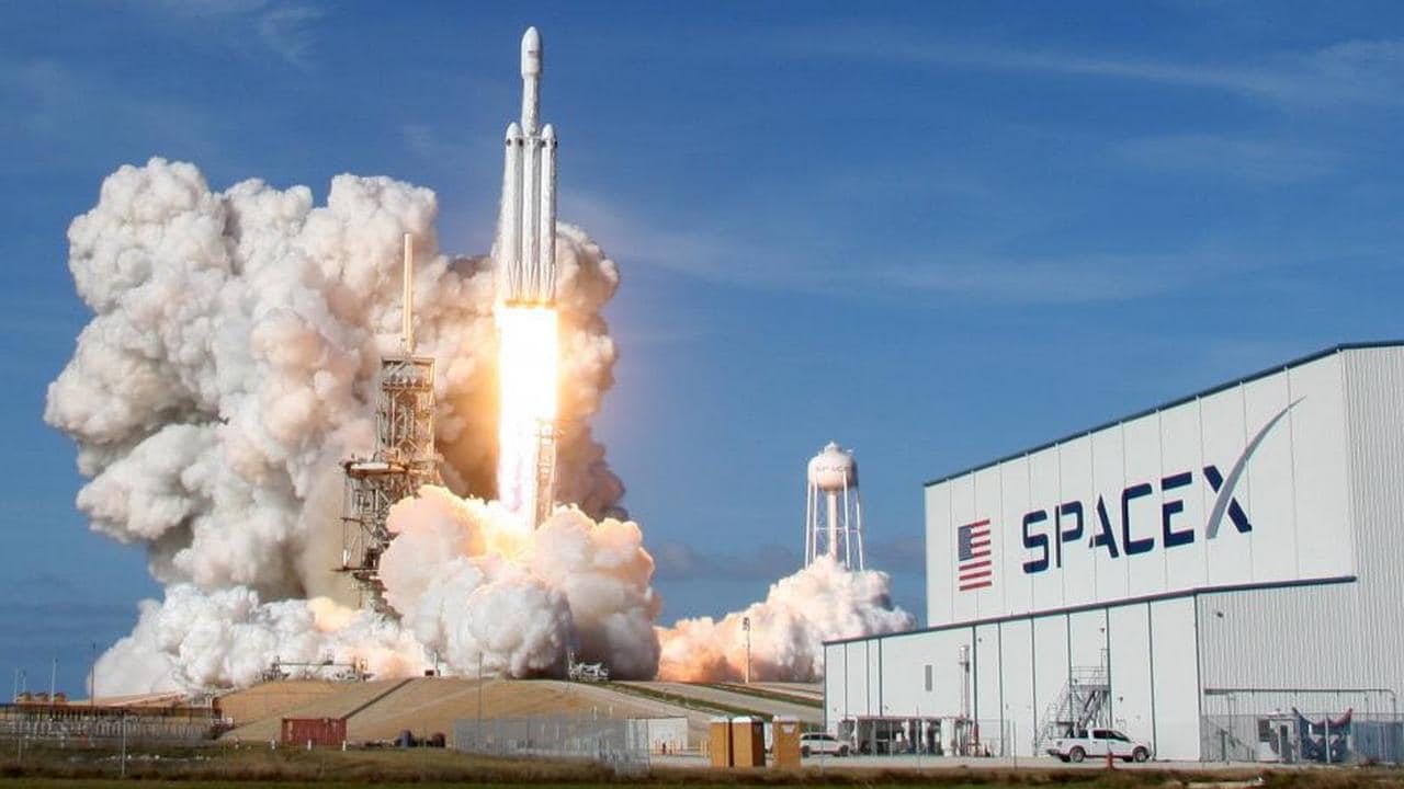 FILE PHOTO: A SpaceX Falcon Heavy rocket lifts off from historic launch pad 39-A at the Kennedy Space Center in Cape Canaveral, Florida, U.S., February 6, 2018. REUTERS/Thom Baur/File Photo
