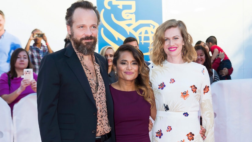 Actor Peter Sarsgaard, left, director Veena Sud, centre, and actress Mireille Enos pose for photographs on the red carpet for the new movie "The Lie" during the 2018 Toronto International Film Festival in Toronto on Thursday. The Associated Press/ Nathan Denette
