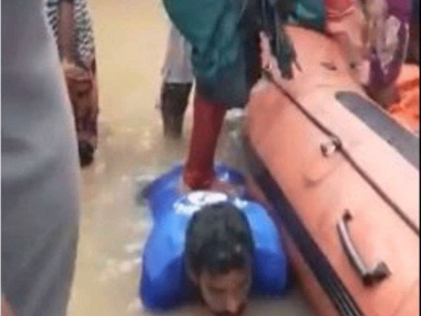 Kerala fisherman, who offered his back as stepping stone to elderly women during floods, gets new Mahindra SUV as reward Kerala fisherman, who offered his back as stepping stone to elderly women during floods, gets new Mahindra SUV as reward