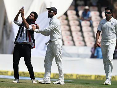 Virat Kohli fan breaches security at Hyderabad stadium to click selfie with Indian captain Virat Kohli fan breaches security at Hyderabad stadium to click selfie with Indian captain