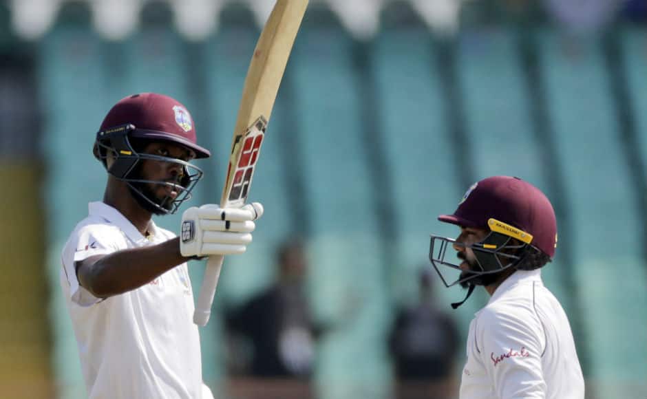 Roston Chase celebrates his fifty during West Indies' first innings on Day 3. AP
