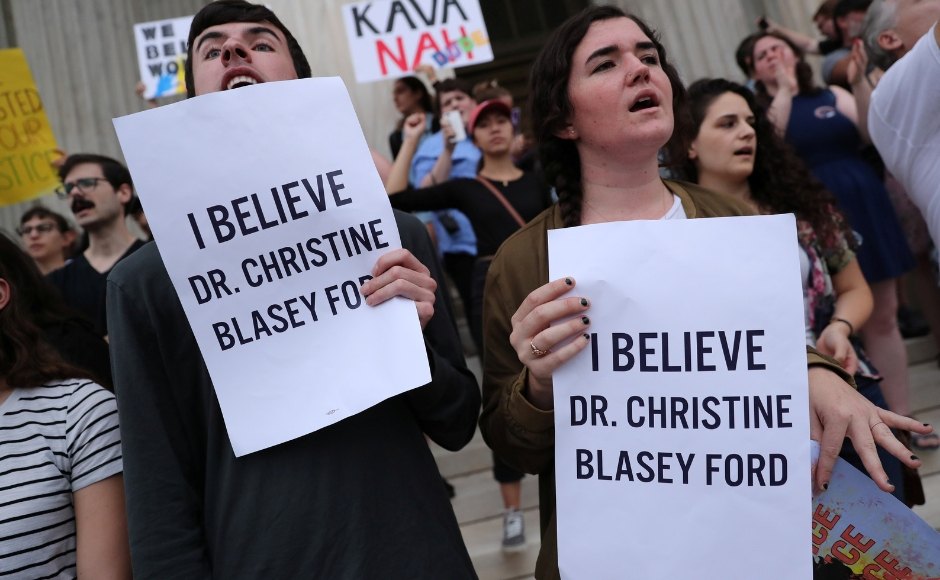 Protesters swarmed the streets of Washington, and rushed to the steps of the Supreme Court to bang loudly on its bronze doors around the time Kavanaugh was set to be sworn in inside. Reuters Protesters swarmed the streets of Washington, and rushed to the steps of the Supreme Court to bang loudly on its bronze doors around the time Kavanaugh was set to be sworn in inside. Reuters