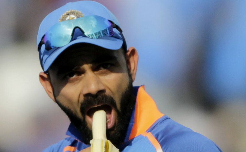 Virat Kohli takes a break during the West Indies innings. AP