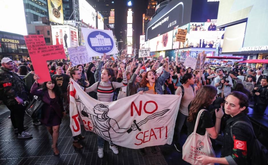 Protesters also disrupted the vote itself in the US Senate multiple times before being dragged from the public galleries, yelling Protesters also disrupted the vote itself in the US Senate multiple times before being dragged from the public galleries, yelling