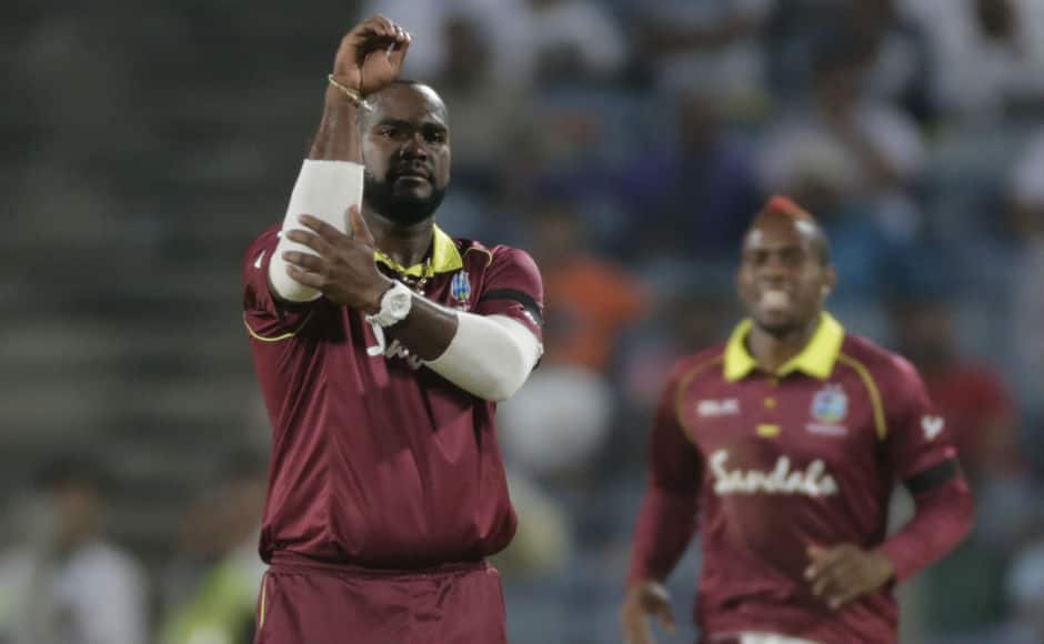 Ashley Nurse celebrates after trapping Shikhar Dhawan lbw. AP
