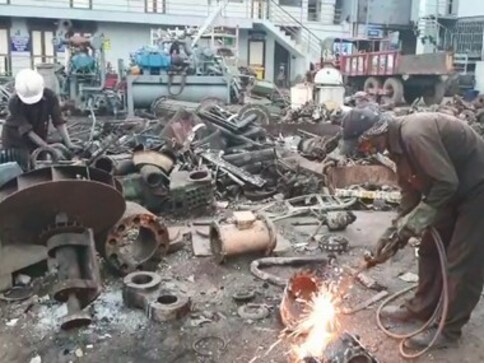 Gujarat migrant crisis: In Bhavnagar's Alang ship breaking yard, it's business as usual for workers from UP, Bihar Gujarat migrant crisis: In Bhavnagar's Alang ship breaking yard, it's business as usual for workers from UP, Bihar