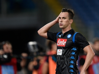 Champions League: Napoli striker Arkadiusz Milik robbed at gunpoint on the way home after win against Liverpool Champions League: Napoli striker Arkadiusz Milik robbed at gunpoint on the way home after win against Liverpool