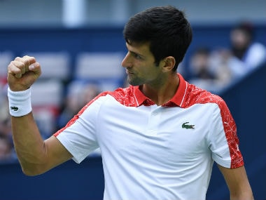 Serbia's Novak Djokovic reacts after winning a point against South Africa's Kevin Anderson during their men's singles quarter-final match at the Shanghai Masters. AFP