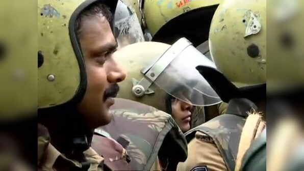 Sabarimala row: Two women, including Hyderabad reporter, begin trek to shrine with police protection amid strong protests
