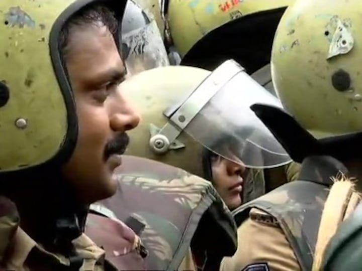 Sabarimala row: Two women, including Hyderabad reporter, begin trek to shrine with police protection amid strong protests