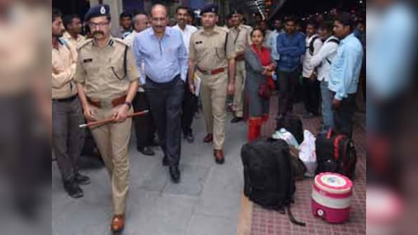 Gujarat migrant crisis: From eating panipuris to visiting railway stations, state police go all out to assuage fears of scared workers