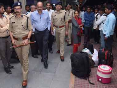 Gujarat migrant crisis: From eating panipuris to visiting railway stations, state police go all out to assuage fears of scared workers Gujarat migrant crisis: From eating panipuris to visiting railway stations, state police go all out to assuage fears of scared workers