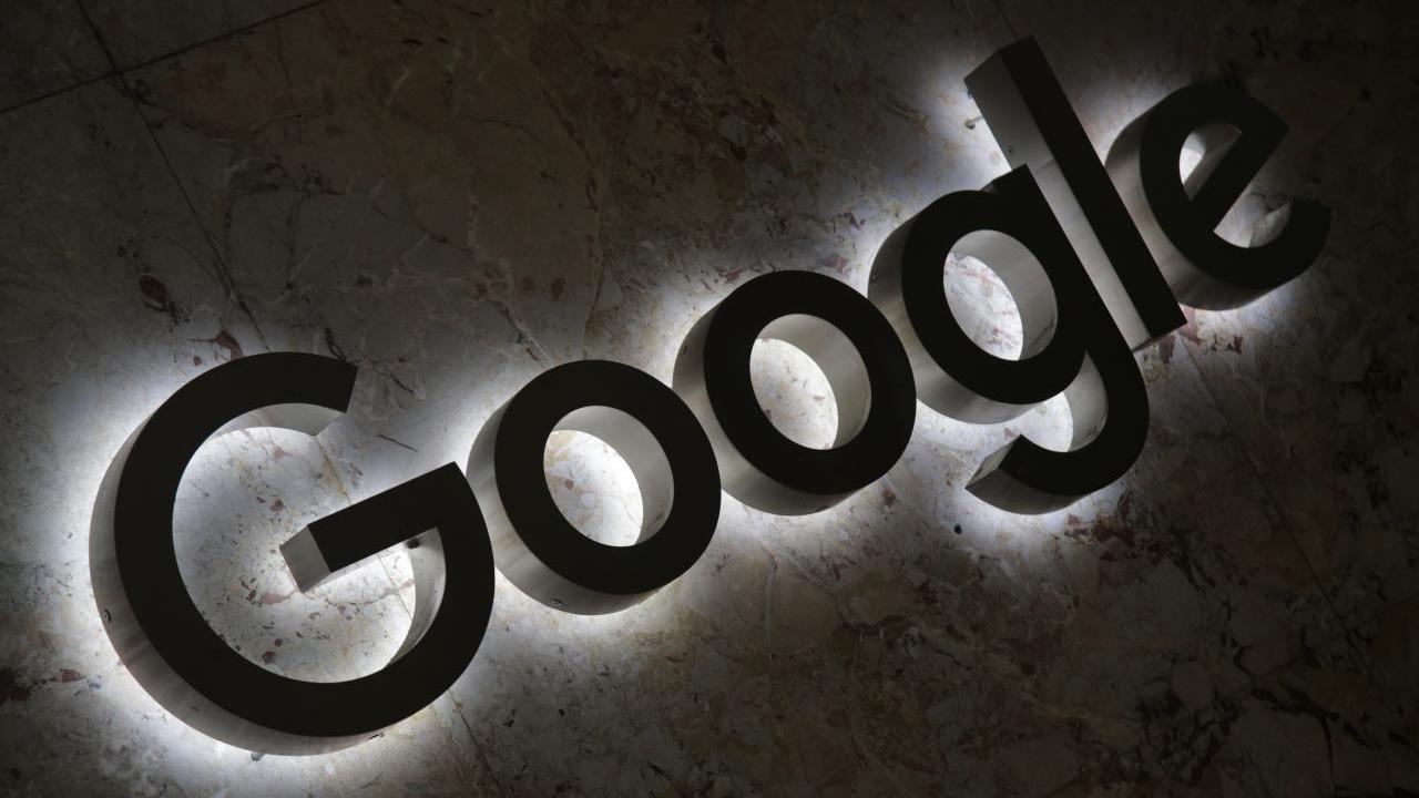A Google logo is displayed at the entrance to the internet based company's office. Image: Reuters.