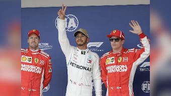 United States Grand Prix: Title-chasing Lewis Hamilton takes pole by just 0.061 seconds in tense qualifying session