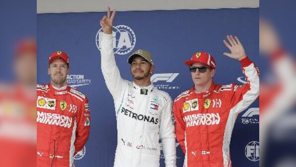 United States Grand Prix: Title-chasing Lewis Hamilton takes pole by just 0.061 seconds in tense qualifying session
