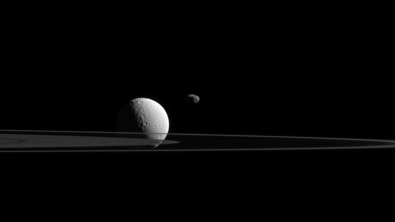 Janus and Tethys, two of Jupiter's moons, hint at one of the key requirements for a submoon to exist - that it be considerably smaller than the moon it orbits. Image courtesy: NASA