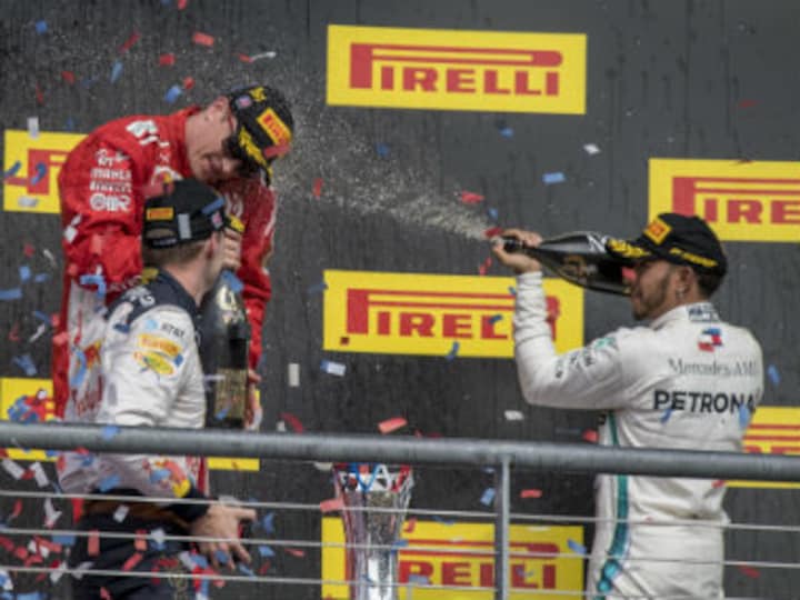 United States Grand Prix: Kimi Raikkonen wins first race in five years as Lewis Hamilton waits for fifth world title after finishing third