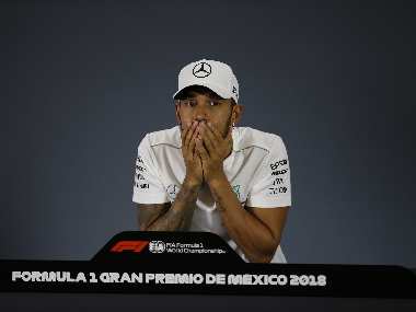 Mexican Grand Prix: Lewis Hamilton joins Juan Manuel Fangio in history books with 'surreal' fifth world championship Mexican Grand Prix: Lewis Hamilton joins Juan Manuel Fangio in history books with 'surreal' fifth world championship