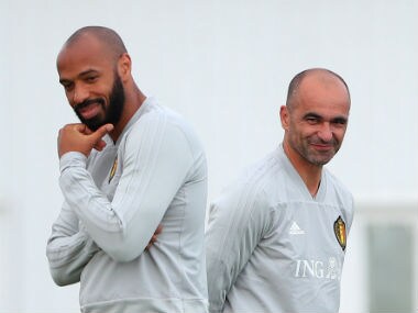 Belgium's assistant coach Thierry Henry with coach Roberto Martinez during training. Reuters