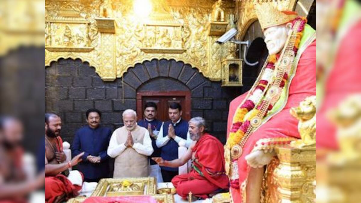 Narendra Modi offers prayers at Shirdi Sai Baba temple, gives house ...