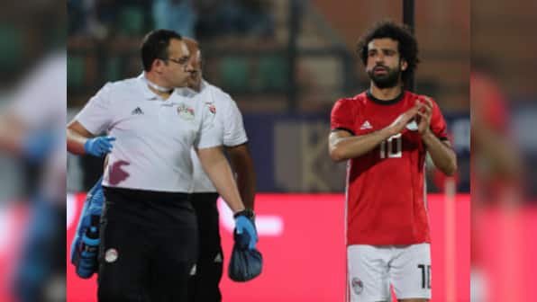 Africa Cup of Nations qualifiers: Egypt's Mohamed Salah scores directly from corner before limping off; Ivory Coast win