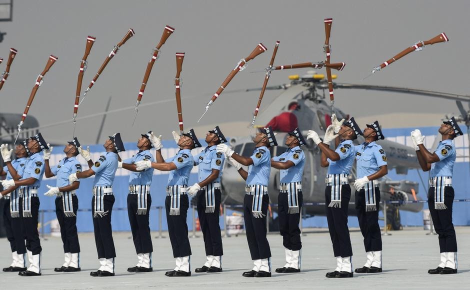 IAF personnel performed a drill with their rifles during the parade on Monday. PTI IAF personnel performed a drill with their rifles during the parade on Monday. PTI