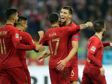 Portugal's Rafa, Ruben Dias and team mates celebrate their second goal. Reuters