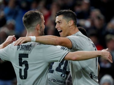 Juventus' Cristiano Ronaldo celebrates scoring their second goal with Miralem Pjanic. Reuters
