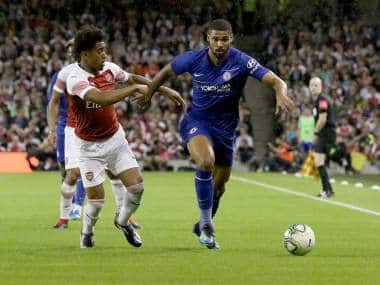 Arsenal’s English midfielder Reiss Nelson (L) vies with Chelsea’s English midfielder Ruben Loftus-Cheek during the International Champions Cup football match between Chelsea and Arsenal the the Aviva Stadium in Dublin on August 1, 2018. / AFP PHOTO / Paul FAITH