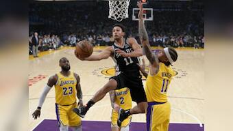 NBA: LeBron James' LA Lakers still winless as Spurs fight back in overtime; Warriors romp to victory over Phoenix