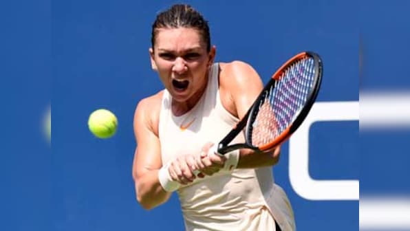 Simona Halep pleased by No 1 ranking but wary of exacerbating back injury by playing in WTA Finals