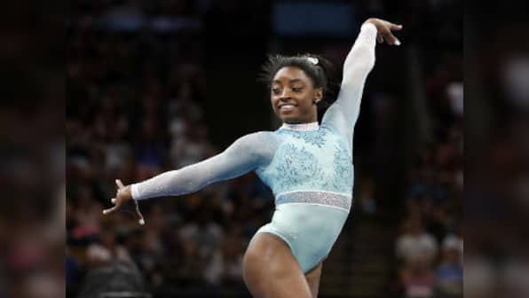 Olympic champion Simone Biles steals the show at World Gymnastics Championships just hours after kidney stone problems