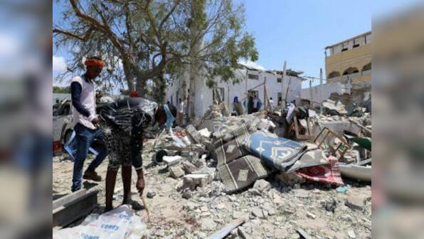 Double suicide blast in Somalia kills 14, injures 20; militant group Al Shabaab claims responsibility for attack