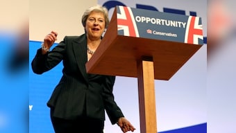 Theresa May dances to ABBA's 'Dancing Queen' before addressing Conservative Party conference, asks party to unite over Brexit